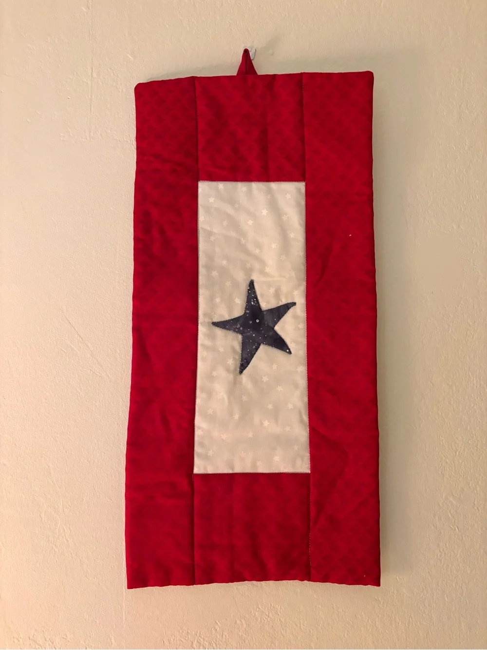 Hand Crafted Red and White Quilted Wall Hanging with Blue Star. Patriotic
